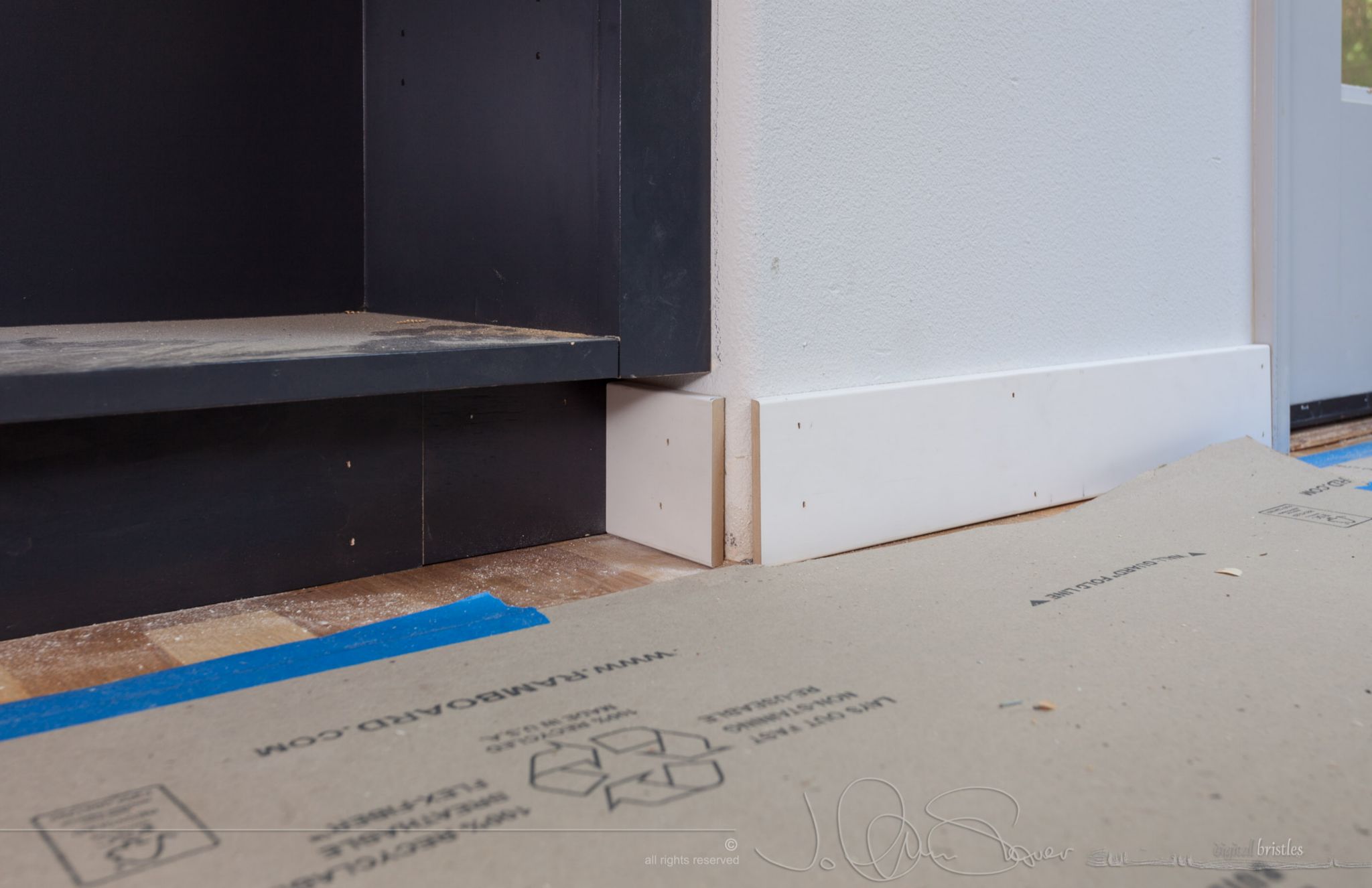 Extra work to make baseboards for round corners. July 15th