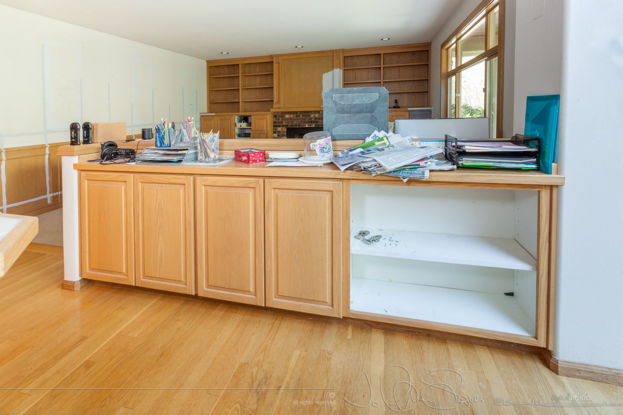 Cupboards were full of cookbooks and the kids' drawing stuff