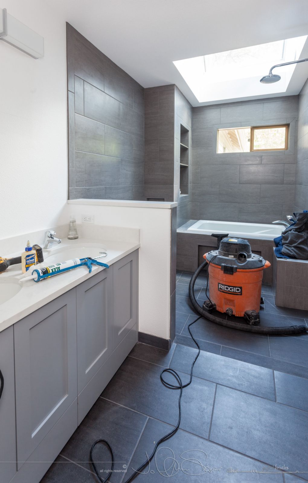 Fixing up the drywall where Caesarstone cap, tile and drywall meet