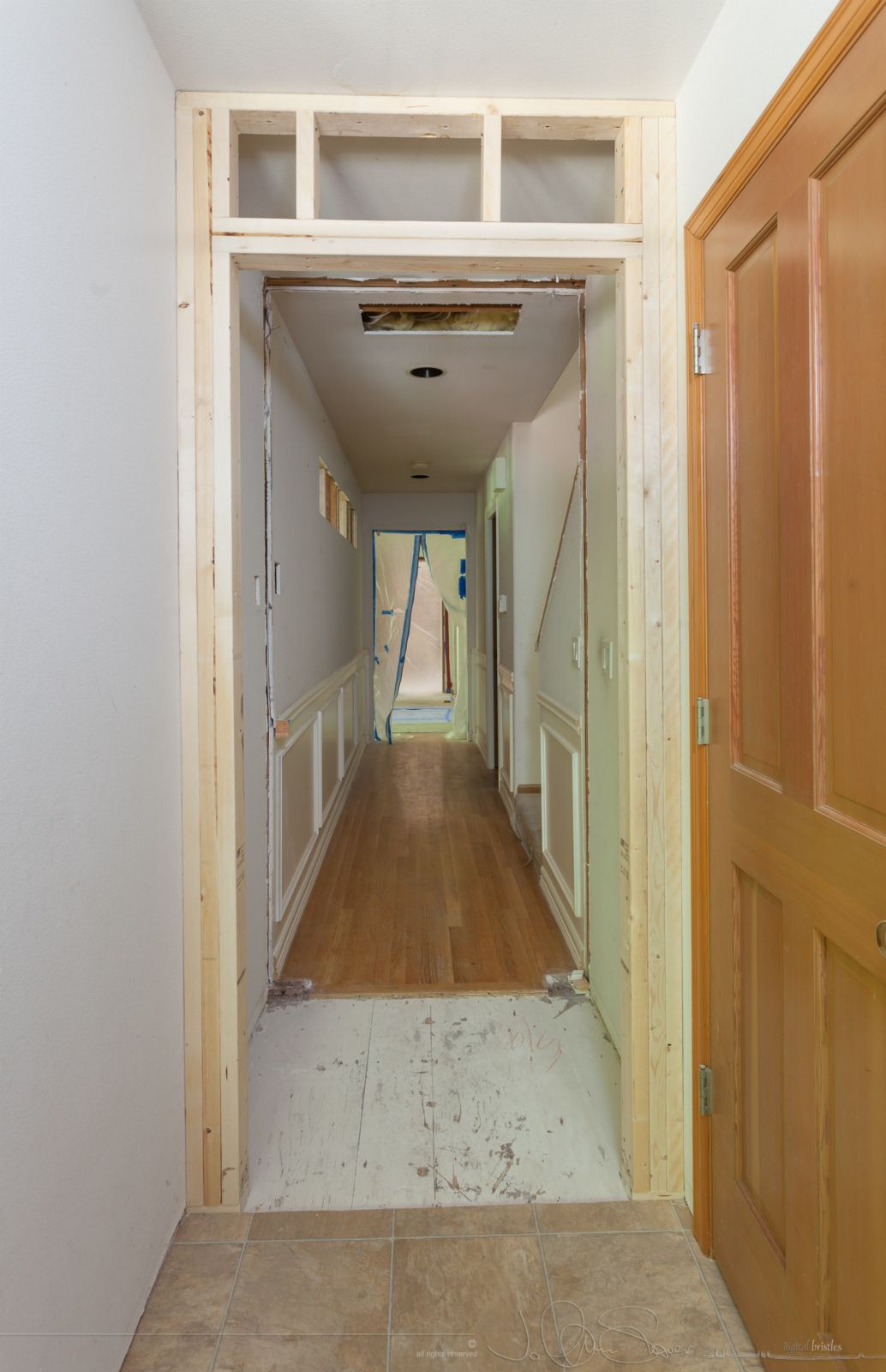 Mudroom doorway new location (to allow for openings in family room wall)